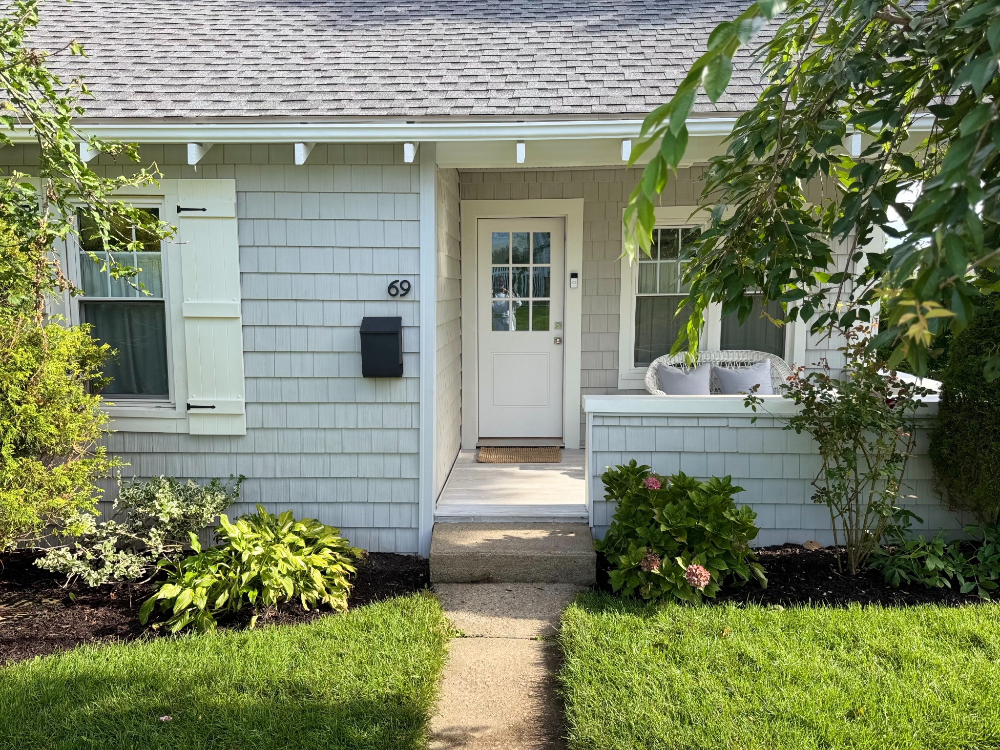 Front entrance, porch and cottage garden